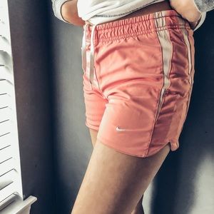 Peach Nike shorts